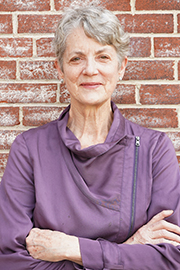 A headshot photo of Lisa Van Amburg