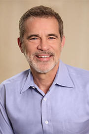 A headshot photo of Mike Isaacson