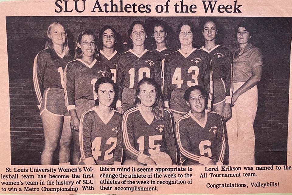 A newspaper clipping showing a photo of a volleyball team.