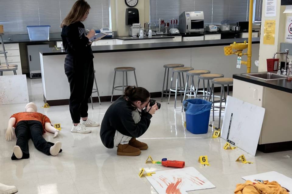 Student takes photos at mock crime scene SLU student takes photos at mock crime scene