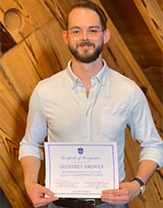 Geoff Brewer holds a certificate