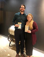 Honeymoon Chocolates founders Cam and Haley Loyett pose with their chocolates which taste good and do good. 