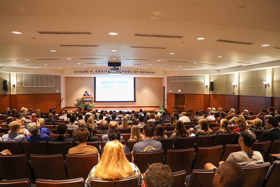 Kruszewksi Offers Keynote Remarks Ron Kruszewksi speaks to an auditorium of nearly 200 people.