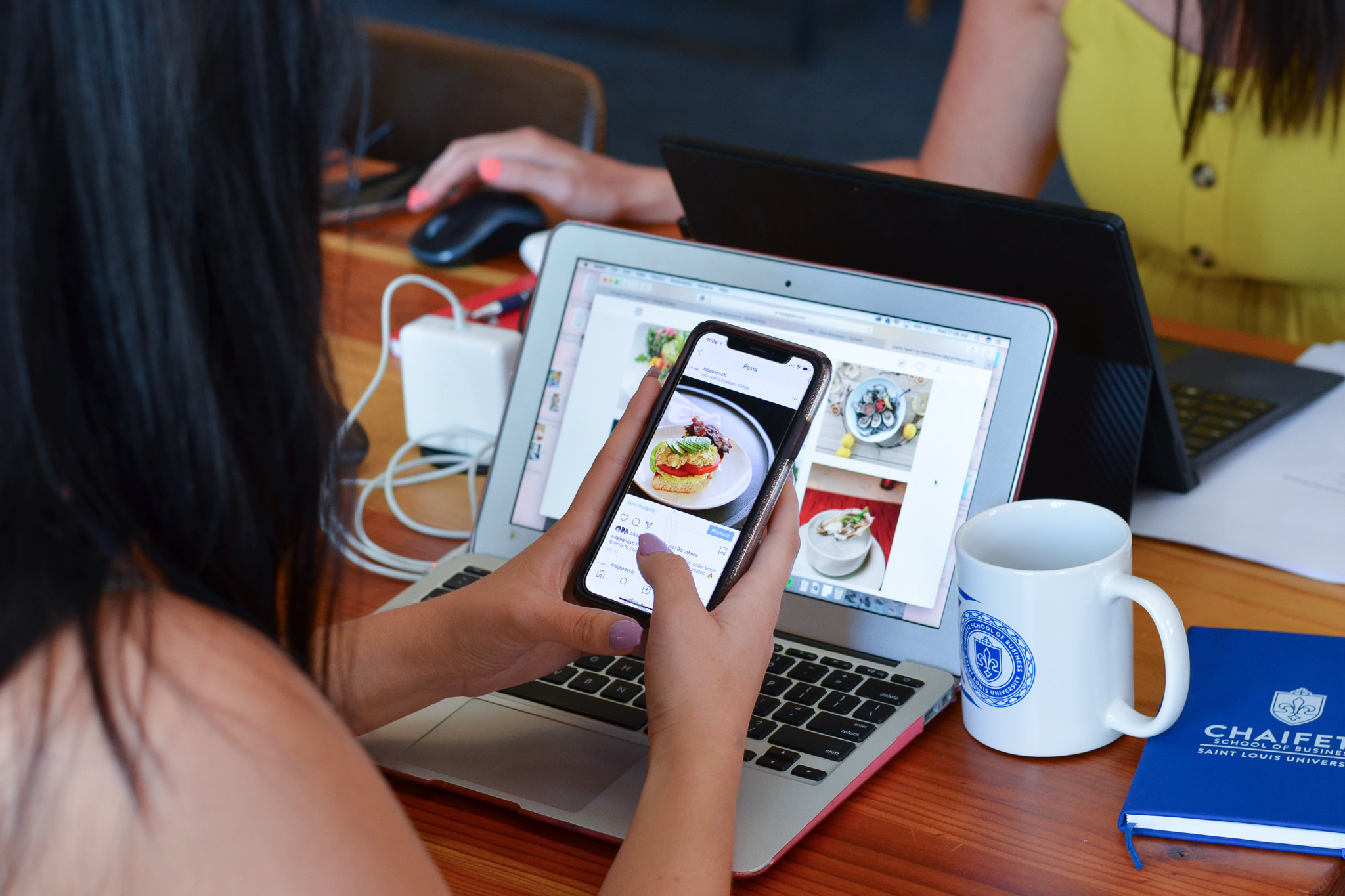 Nikolaisen creates social media content during her internship at Jasper Paul PR and Marketing. 