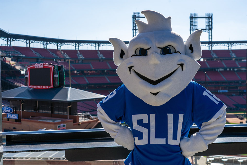 The SLU Billiken poses at Busch Stadium
