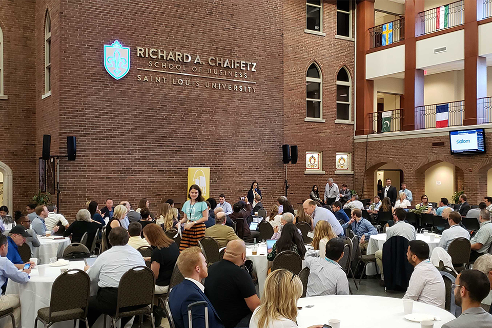 In this 2019 photo, students gather in the atrium of Cook Hall for Arch Grants Finalist Pitch Day