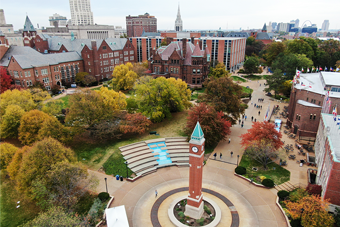 Aerial photo of the iconic clock tower and surrounding fountain on the campus of Saint Louis University, just outside the Chaifetz School of Business.