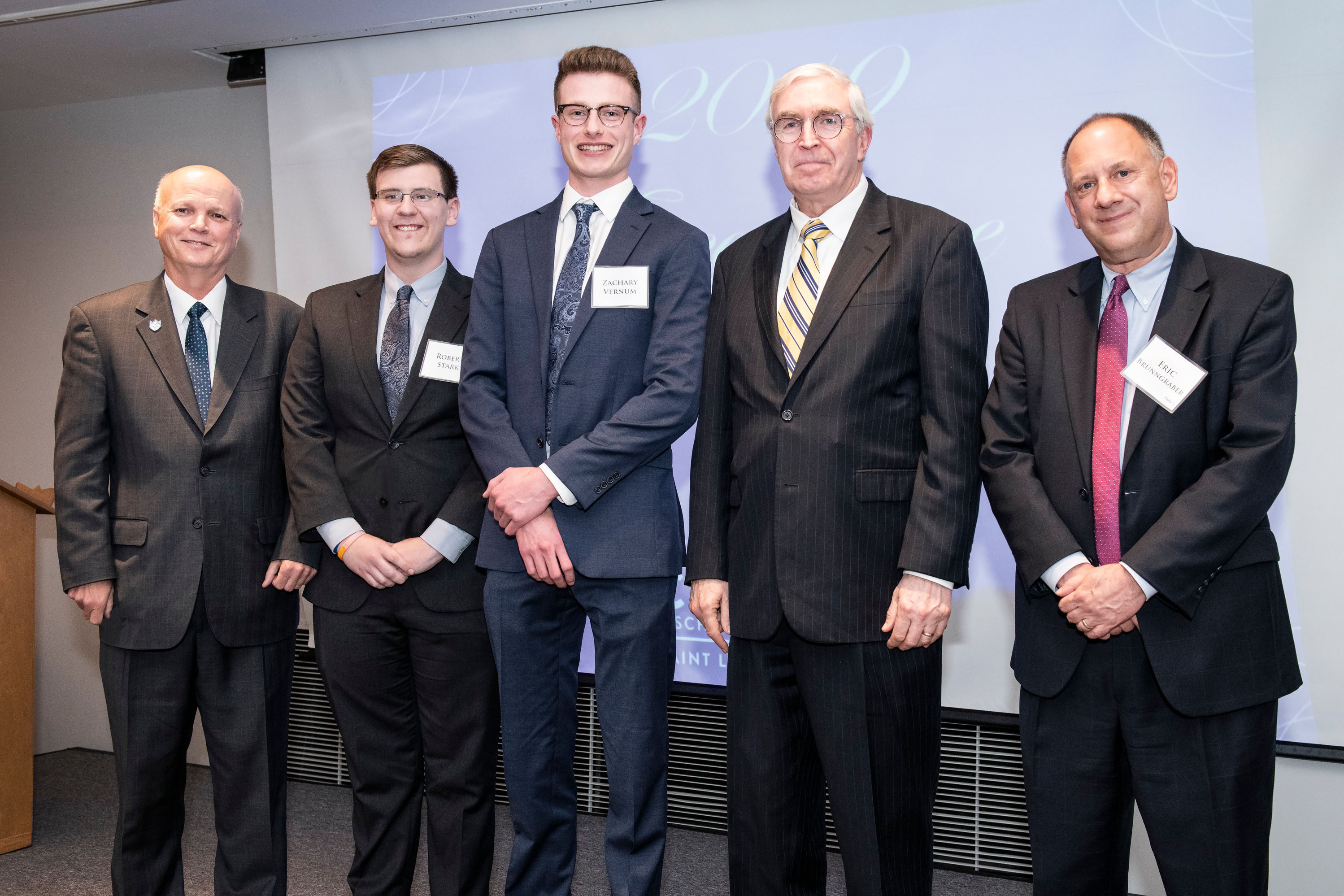 Left to Right, Mark Higgins, Robert Start (junior), Zachary Vernum (senior), Chet Gillis (Provost) and Eric Brunngraber (CEO of Cass Information Systems, Inc.)