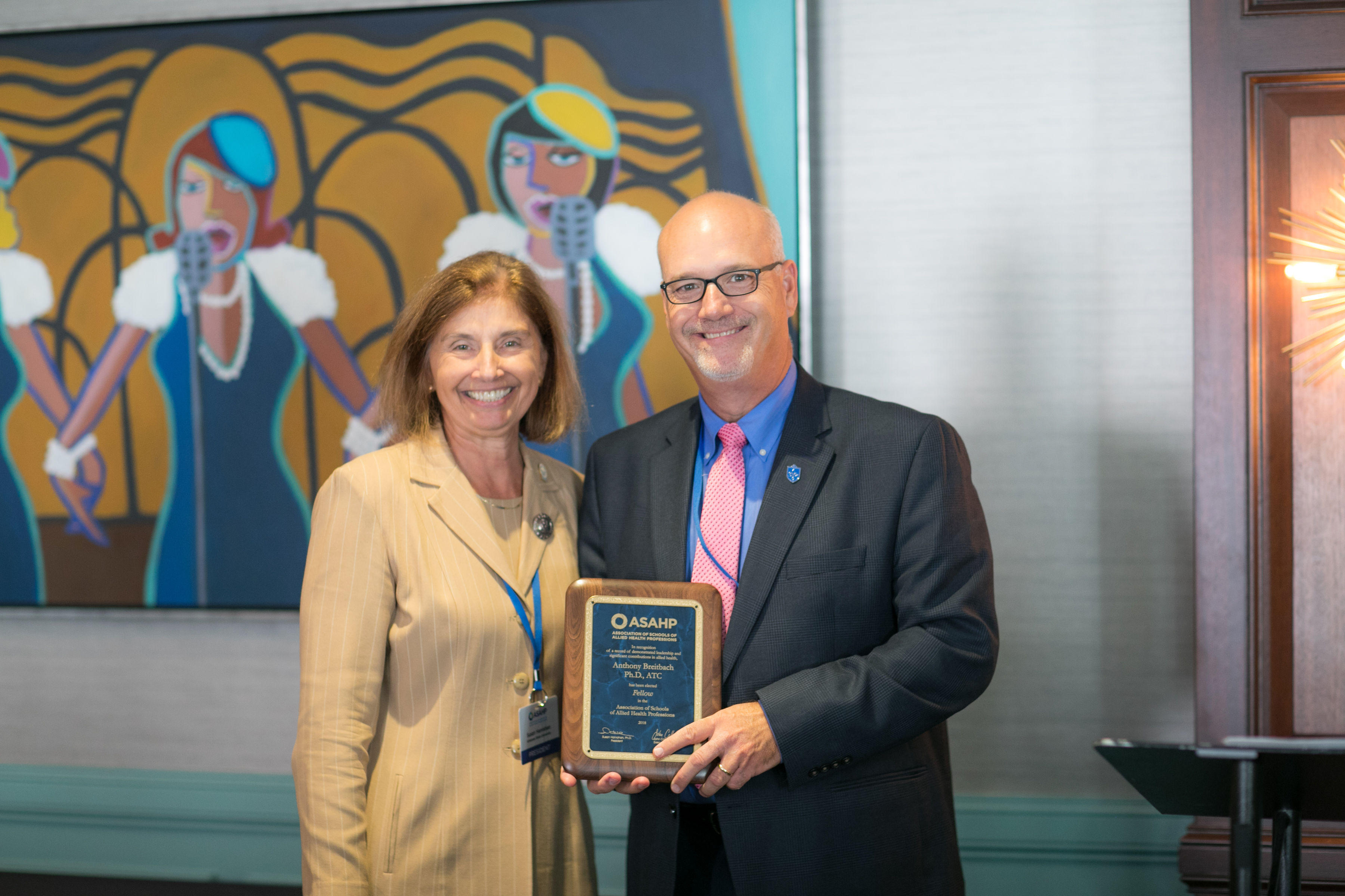 Dr. Breitbach Receiving Award