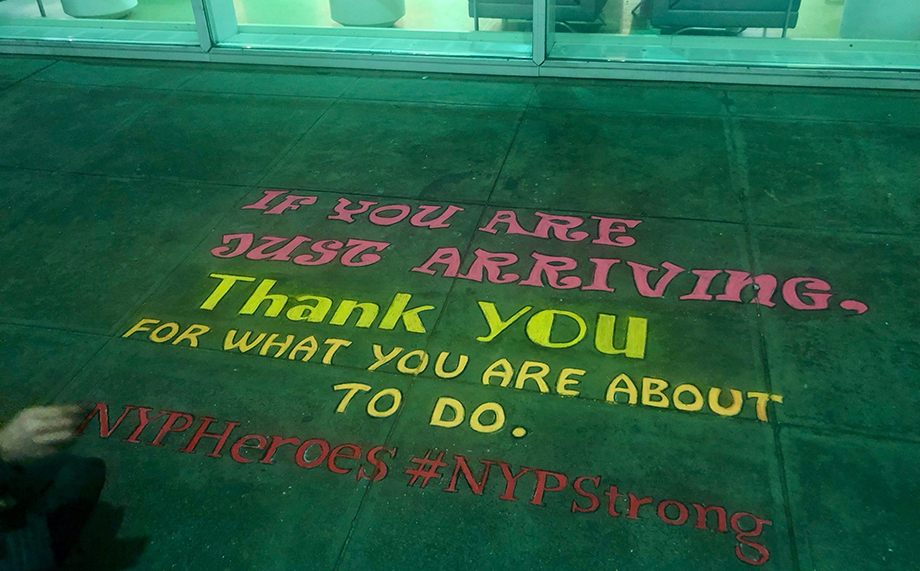Chalk art outside of Ziesig's hospital thanking the front line workers.