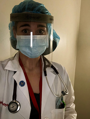 Kelsey Ziesig, SLU PA Alumna, Preparing for a shift at a New York City hospital.