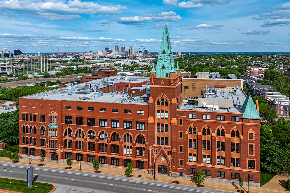 A view of a large brick building from above.