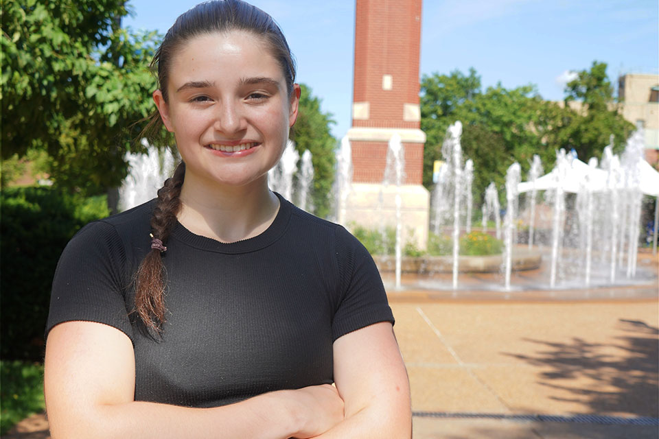 Anna Durfey A student poses for a photo outside on campus.