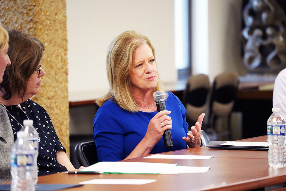 Marsha Benney, CFO of Midwest BankCentre, speaks about the Center for Bosnian Studies and its impact on the community during a celebration held at Fontbonne University. Midwest BankCentre gifted $10,000 to support the center's relocation to Saint Louis University. SLU photo.