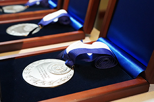 A medal in a box.