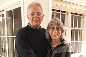 Ira and Beth Rutkow pose for a photo.