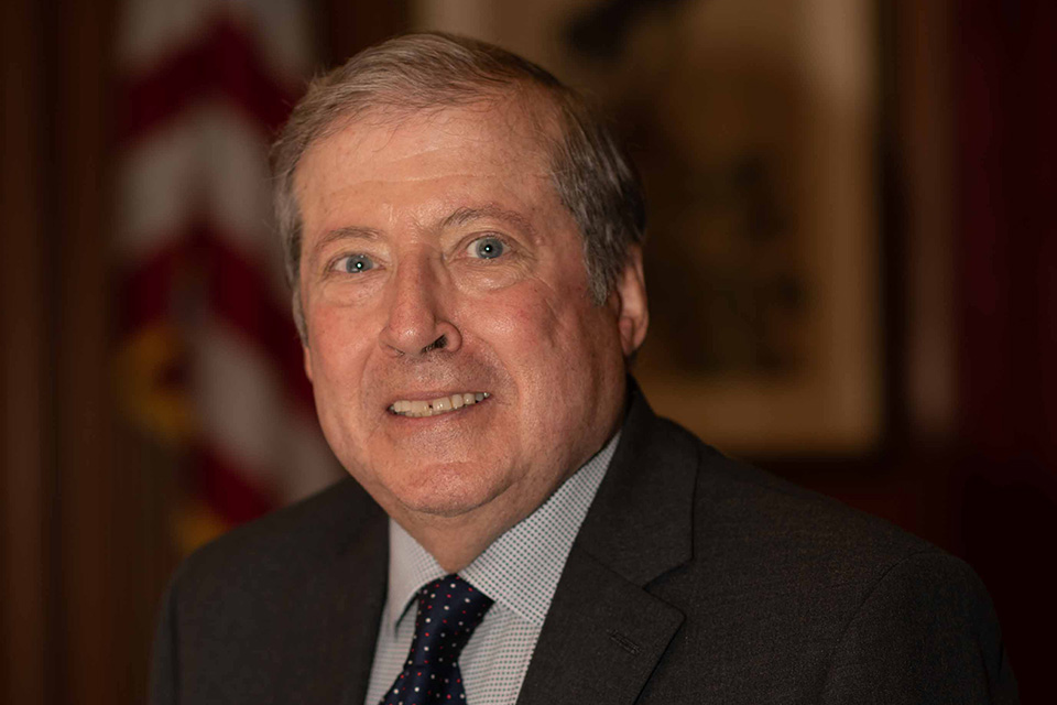 A headshot photo of Joe Cattaneo.