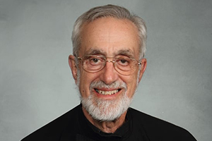 A headshot of Theodore Vitali