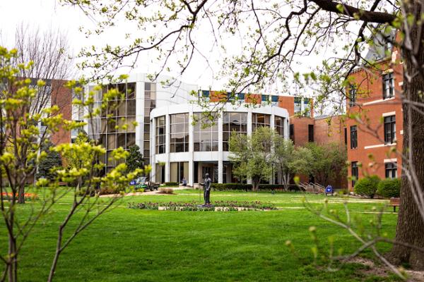 Pius Library exterior in spring