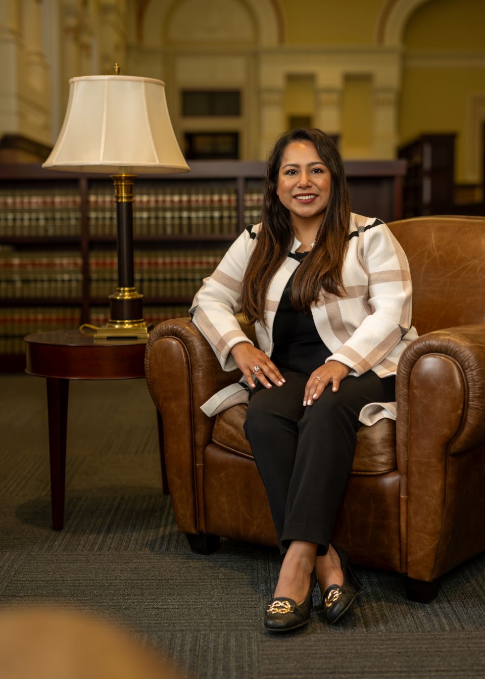 Lucy Diaz poses in the library at the courthouse Lucy Diaz poses in the library at the courthouse