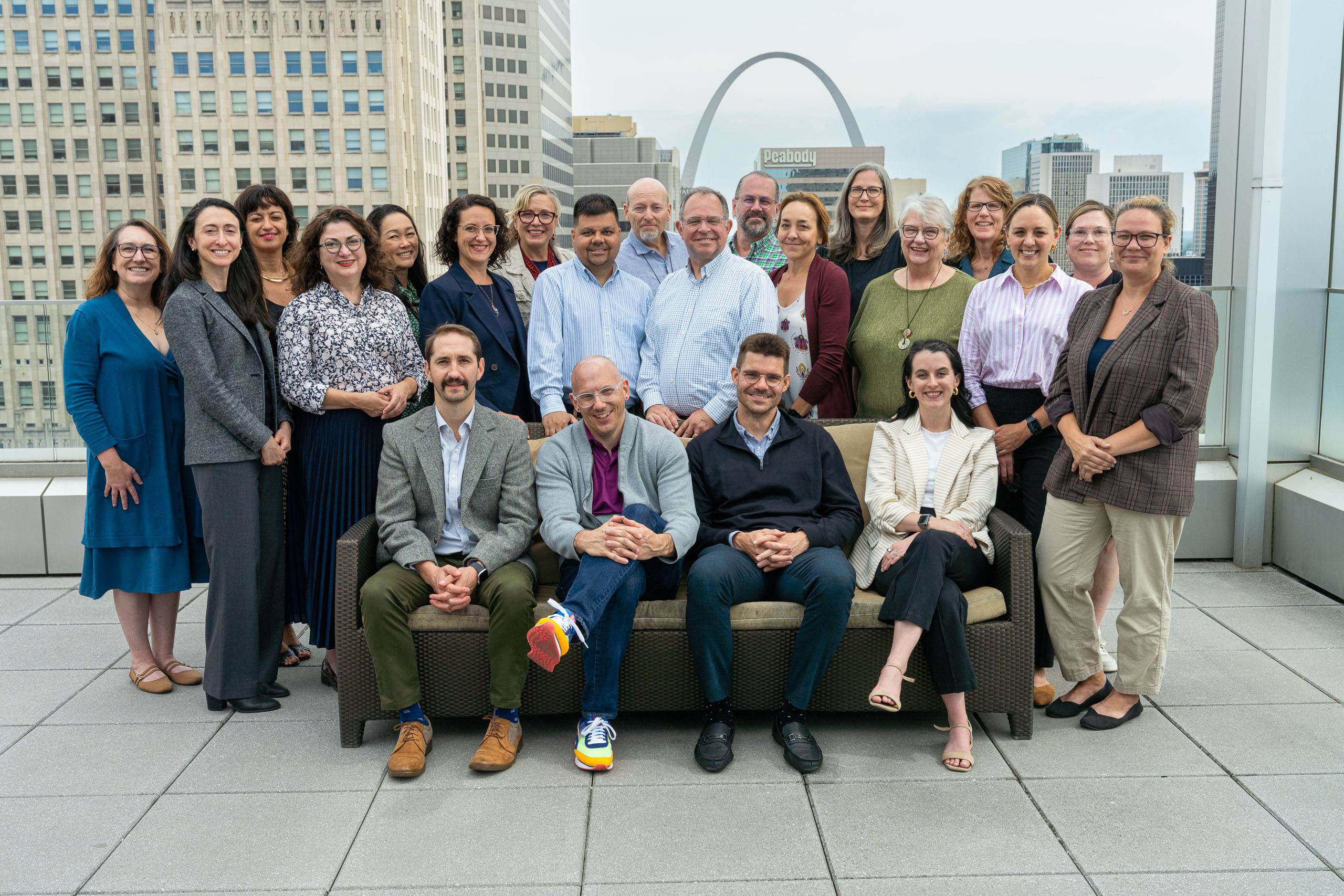 Group photo of the participants in the Health Law Scholars Workshop on the roof of Scott Hall overlooking the Arch Health Law Scholars 2025