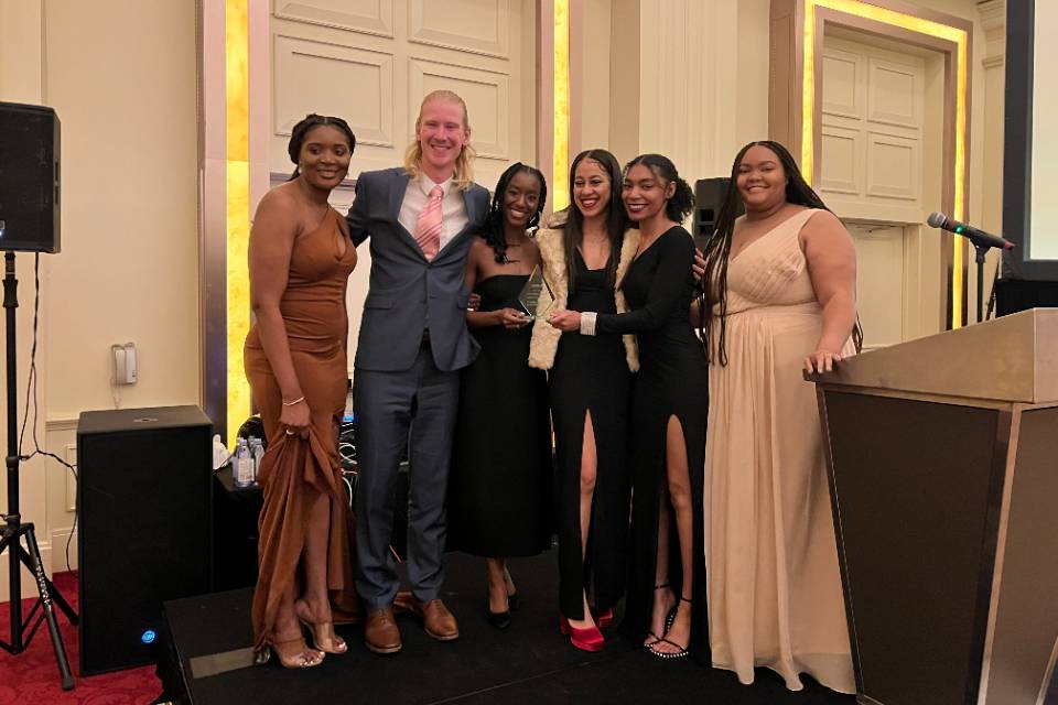 The Spring 2023 Black Law Student Association team poses with their award at the banquet