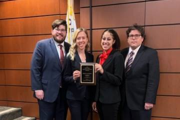 SLU LAW Philip C. Jessup International Moot Court Team participants Jacob Wells, Rashae Williams, Katie Hoffecker, and Tim Sutton with their second place prize.