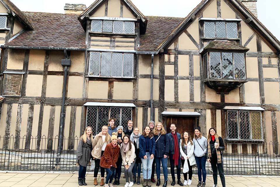 Group photo in front of Shakespeare's place of birth.