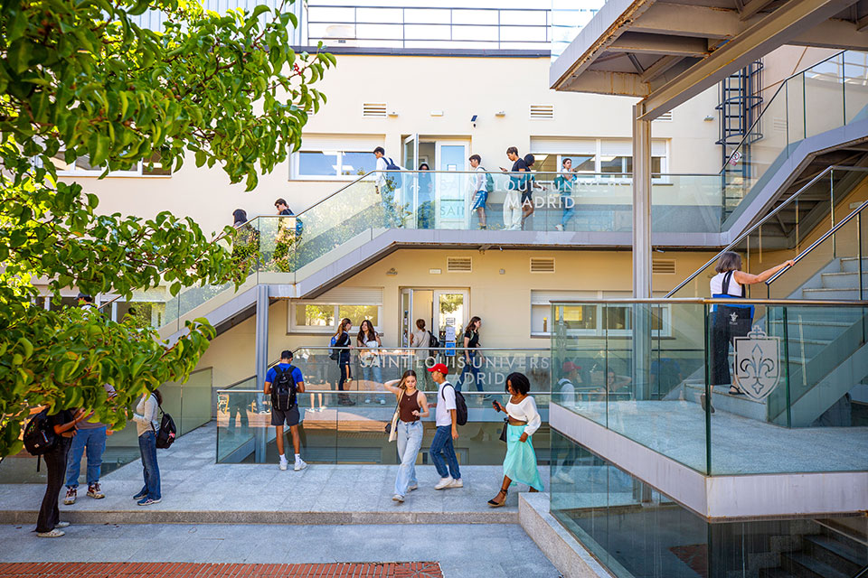 Students walking between classes at Padre Rubio Hall.