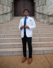 Sabareesh Pitchumani Sundarraj posing outdoors in a white coat