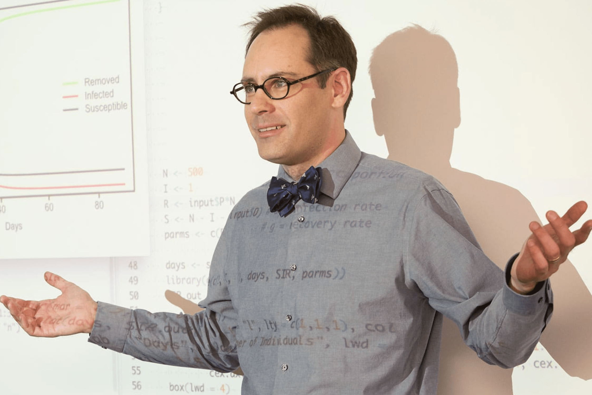 Professor in front of whiteboard