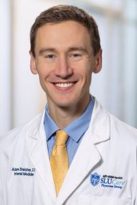 Headshot of Adam Streicher