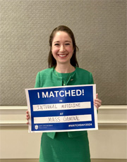 Headshot of Jessica holding her match day sign