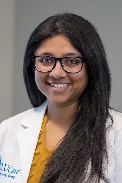 Headshot of Dipika Menon