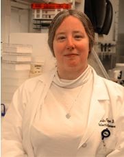 Sarah Geroge, MD woman in labcoat