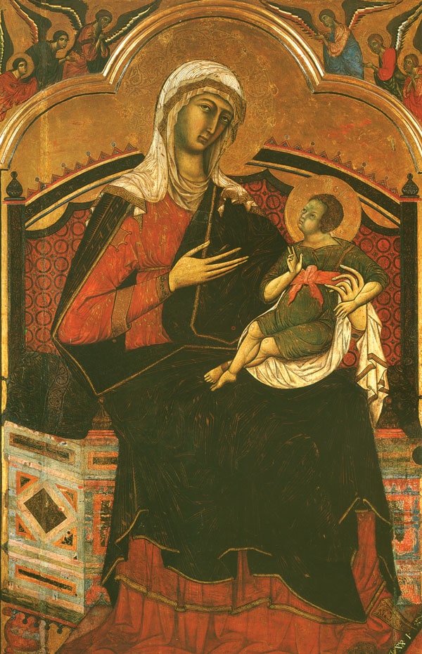 Mary, seated on a great throne and wearing a red dress with a deep blue mantle, gestures with her right hand toward the child Jesus seated on her lap.