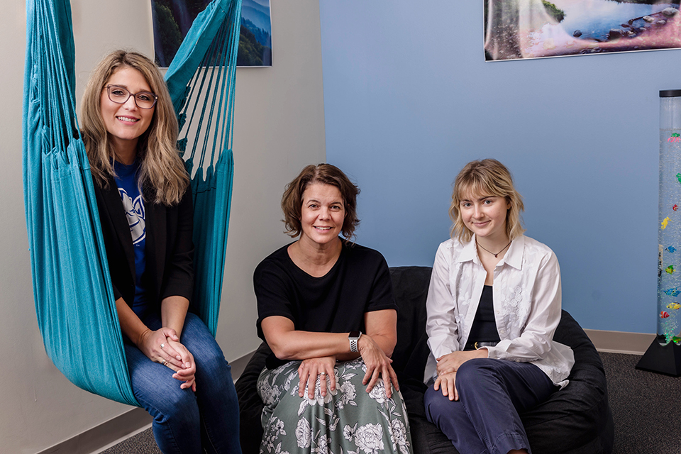 A photo of three women.