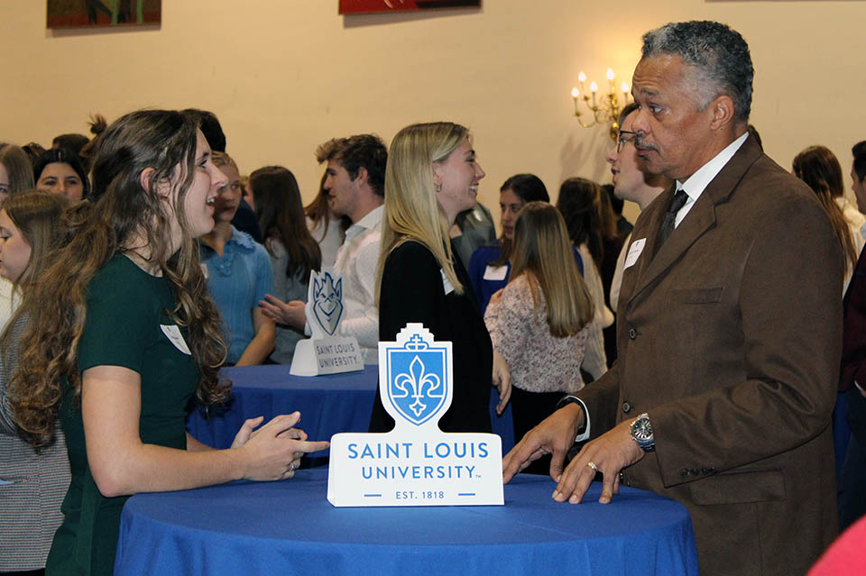 Caitlin Conrad speaks with Wayman Butler of Eli Lilly at the Career Service Etiquette Dinner on Tuesday, Nov. 15, 2022. 