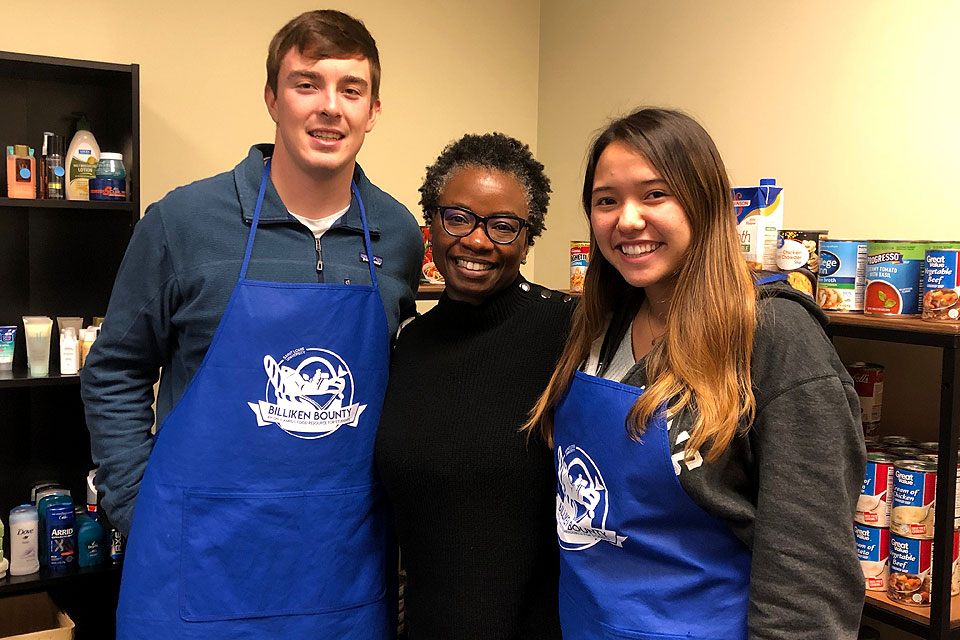 Mona Hicks, Ed.D., and Billiken Bounty volunteers