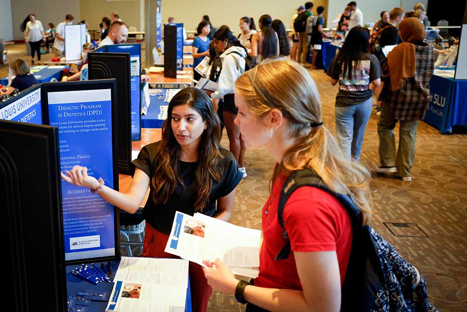 Students visit with faculty and staff during the Academic Fair to learn about ways to choose and/or enhance their current degree programs.