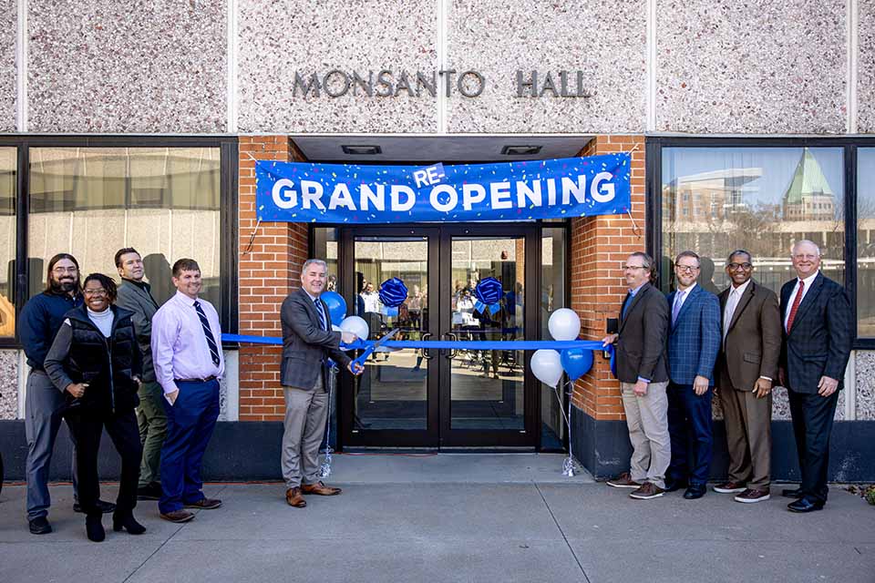 Provost Michael Lewis, Ph.D., cuts the ribbon during the Grand Re-Opening of Monsanto Hall on November 2, 2023.