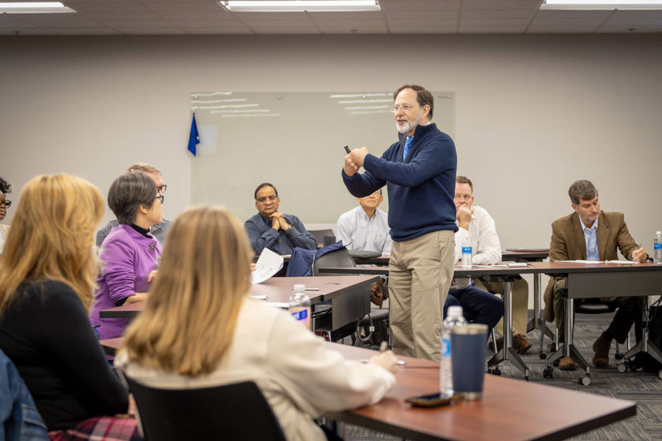 Jackson Nickerson, Ph.D., Edward Jones Dean of the Chaifetz School of Business, presents during a workshop. 