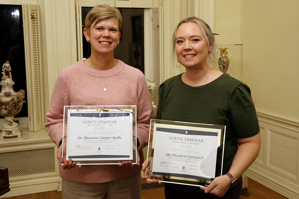 Shannon Cooper-Sadlo, Ph.D. (Social Work), left, and Meadow Campbell, Ph.D. (Center for Anatomical Science and Education) were recognized for their work in teaching Ignite seminars. 