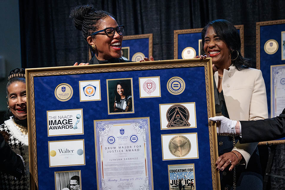 Author, Community Organizer and Social Activist, Ilyasah Shabazz, center, accepts the Drum Major for Justice Award during  the Martin Luther King Jr. Memorial Tribute on January 18, 2024.
