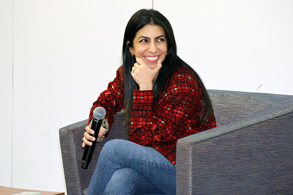 Eman Mohammed smiles during the question-and-answer session at the 2024 Atlas Week Signature Symposium on Thursday, April 11. Photo by Joe Barker.