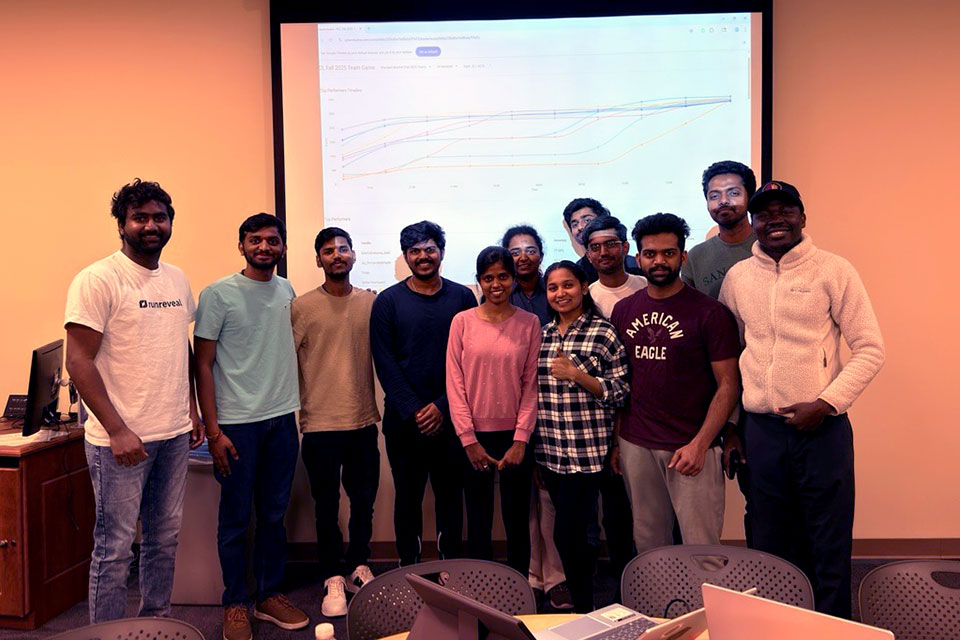 students smile for the camera