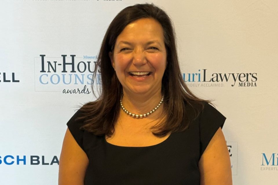 a woman smiling at the camera