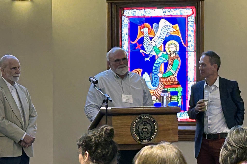 Saint Louis University professors William Rehg, S.J., and Kent Staley, Ph.D. talk with University of San Francisco’s David Stump. Stump presented his paper, “Lessons from Pragmatism for Philosophers of Science: Nine Teachings and a Cautionary Tale” on day one of the conference. Submitted photo.