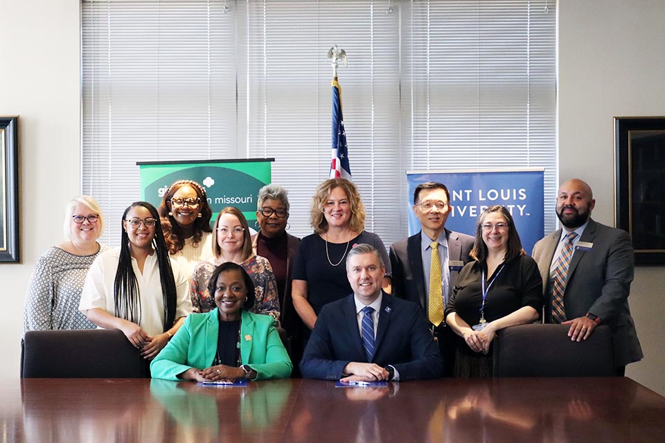 SLU and the Girl Scouts of Eastern Missouri sign an agreement