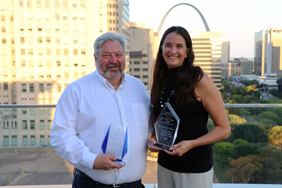 David Kaplan, Ph.D., left, and Anne K. Sebert Kuhlmann, Ph.D., were honored at the Faculty Senate Kickoff Dinner on Tuesday, Sept. 16, 2025..  Photo by Joe Barker.
